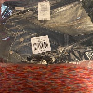 2  Torrid shirts 1 pair of Torrid jeans